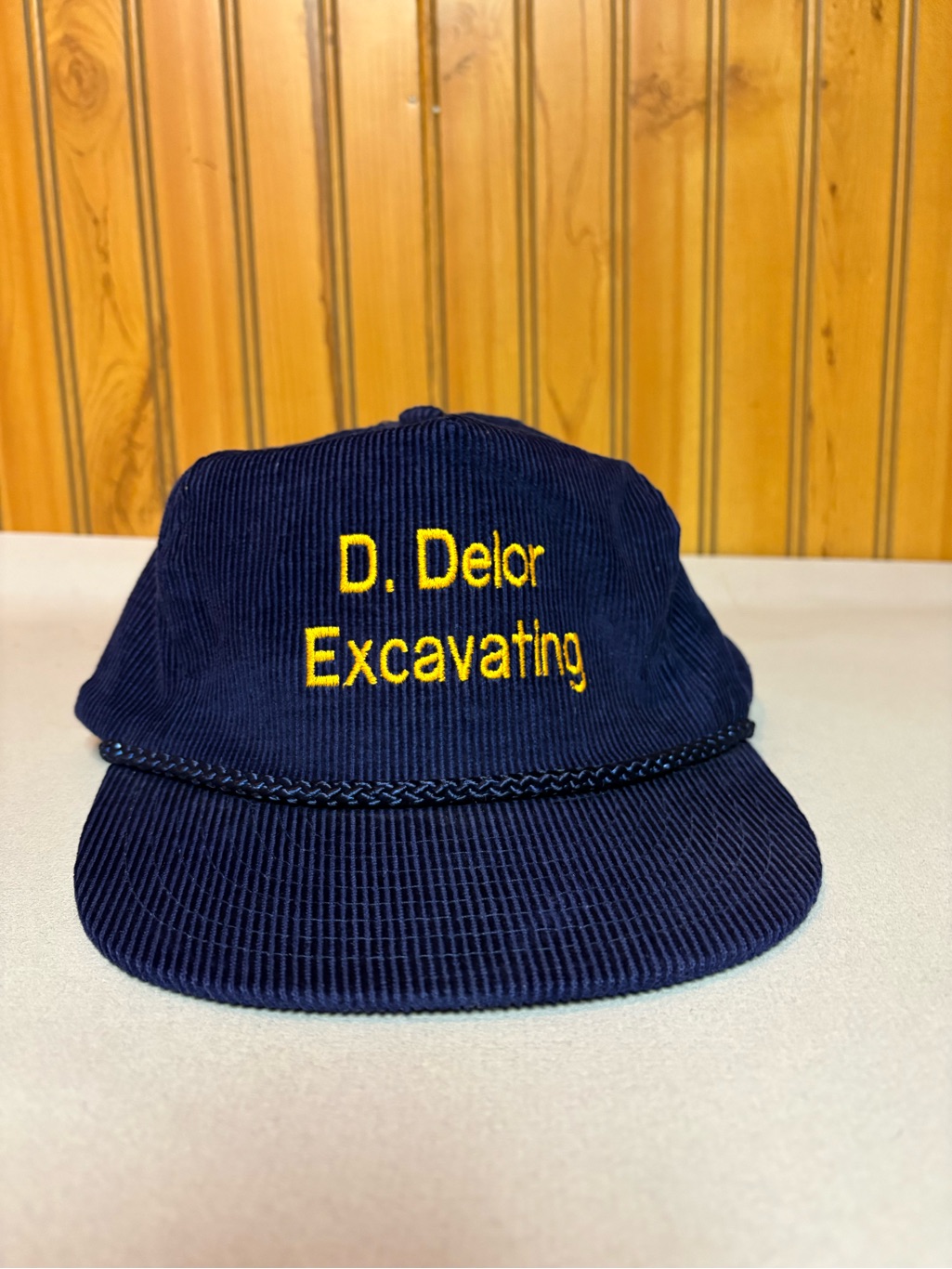 D Delor Excavating Embroidered Navy Corduroy Hat